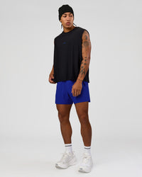 Man wearing UltraAir 5" Lined Performance Short  - Electric Indigo | Model:Malebo | Size:M