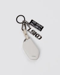 Studio image of 1% Better Key Ring - Black-Gun Metal | Thumbnail Index: 1