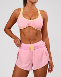 Studio image of Accelerate Run Belt - Lemon-Pink Rose | Thumbnail Index: 2
