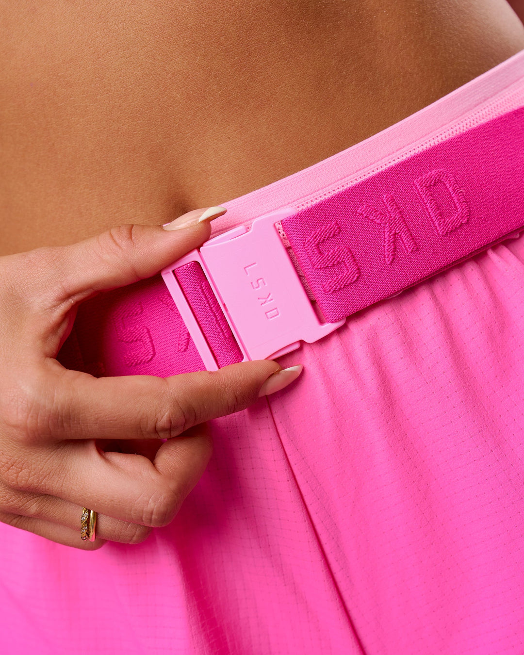 Studio image of Accelerate Run Belt - Ultra Pink-Pink Rose - view 9