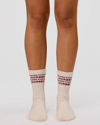Studio image of Enjoy the Journey Pilates Grip Socks - Off White-Plum Caspia | Thumbnail Index: 3