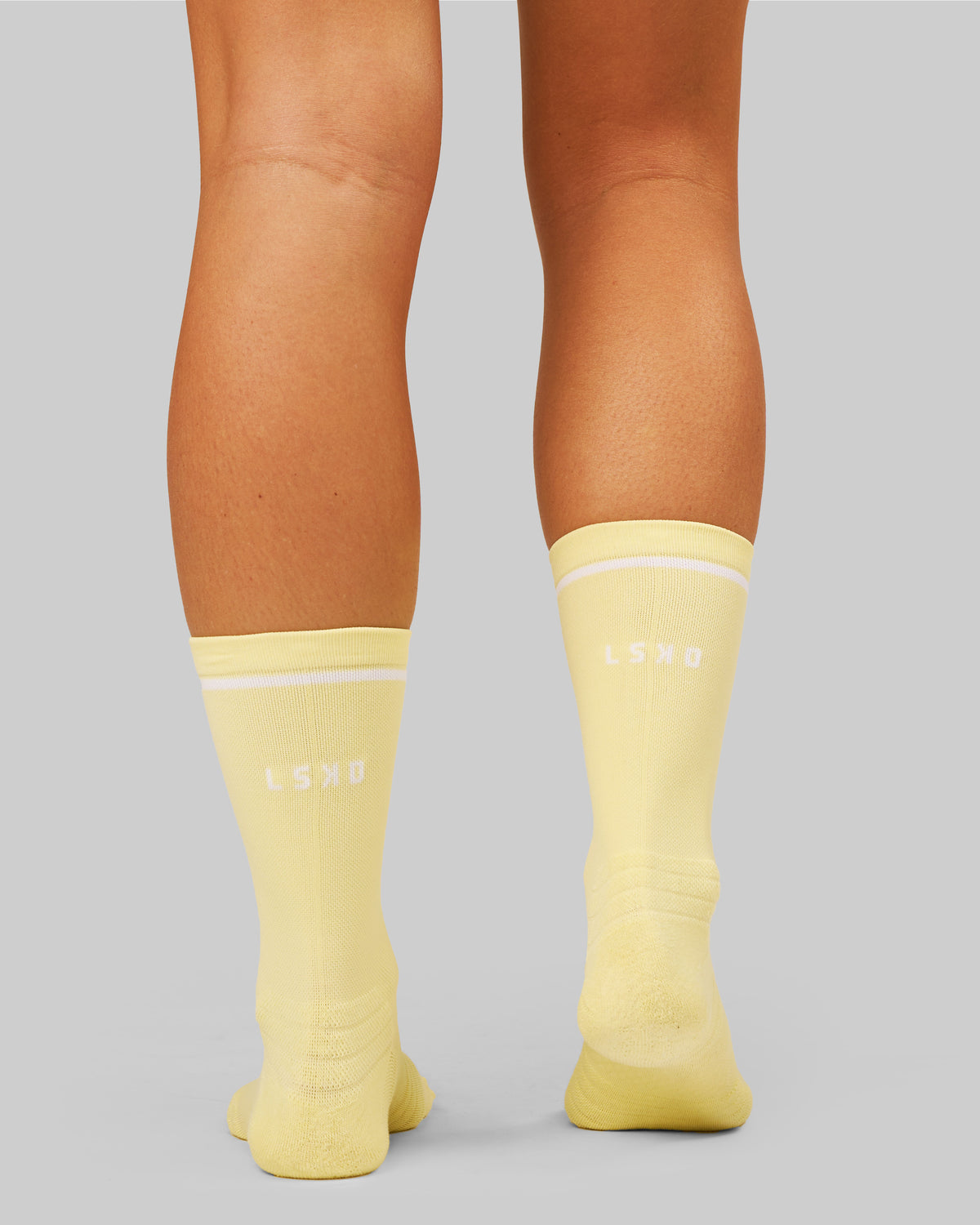 Studio image of Fast Performance Crew Socks 2.0 - Lemon-White