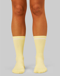 Studio image of Fast Performance Crew Socks 2.0 - Lemon-White | Thumbnail Index: 4
