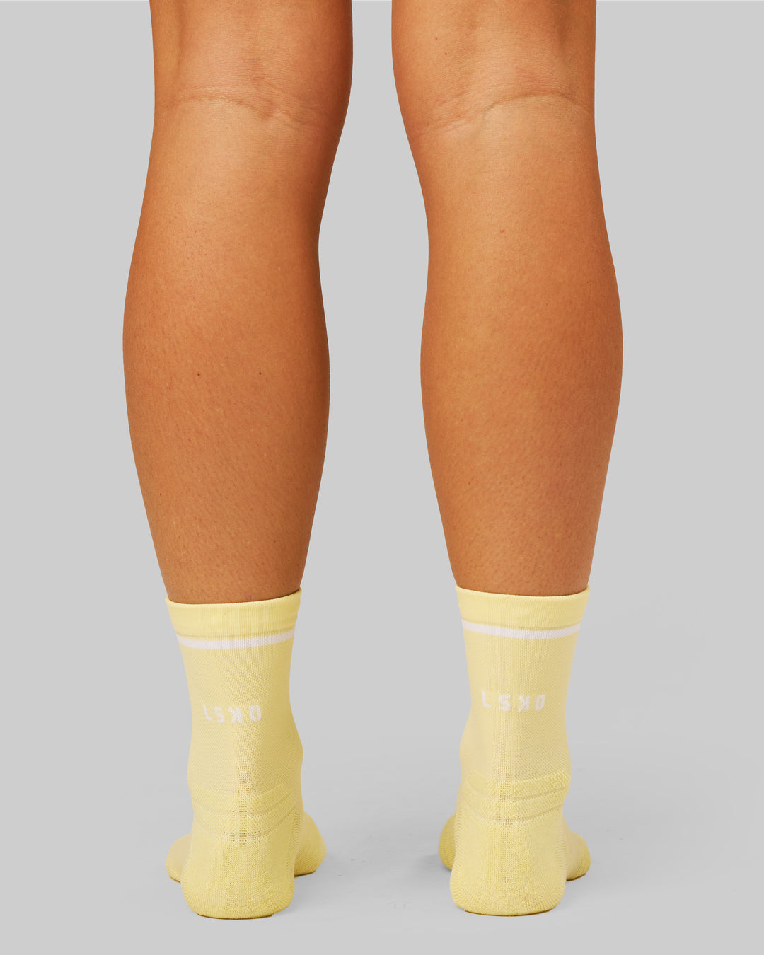 Studio image of Fast Performance Quarter Socks 2.0 - Lemon-White - view 3