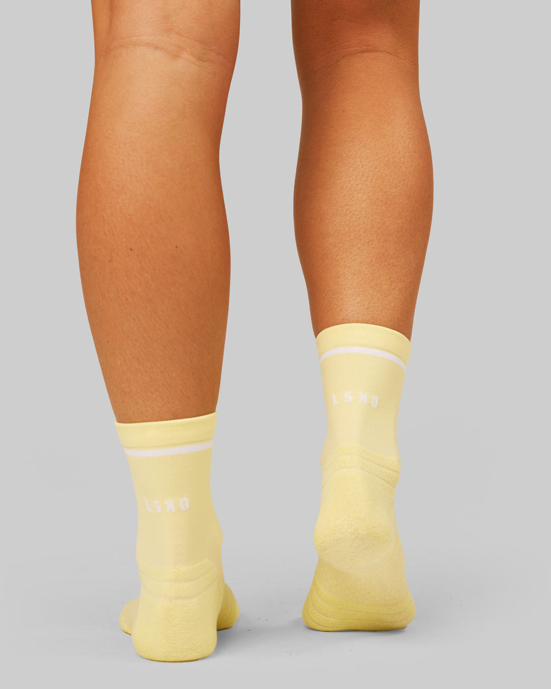 Studio image of Fast Performance Quarter Socks 2.0 - Lemon-White - view 4
