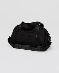Studio image of Go-To Mini Duffle Bag - Black | Thumbnail Index: 0