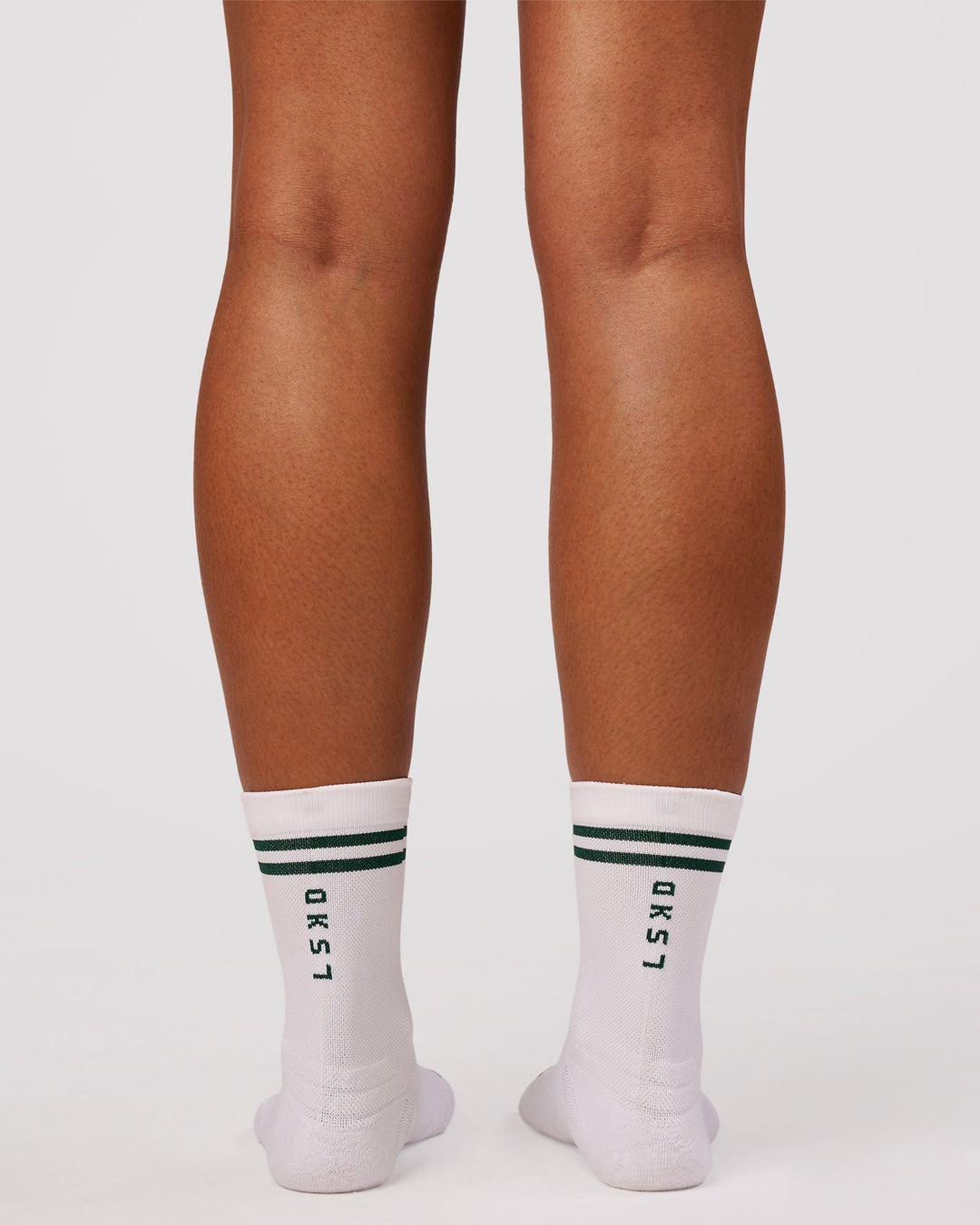 Studio image of Here Now Performance Quarter Socks - Midnight Green - view 4