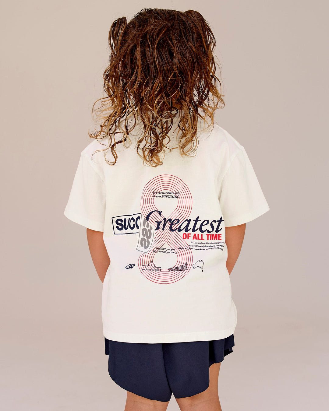 Studio image of Kids Greatest of All Time FLXCotton Tee - Off White Washed-Scarlet - view 1