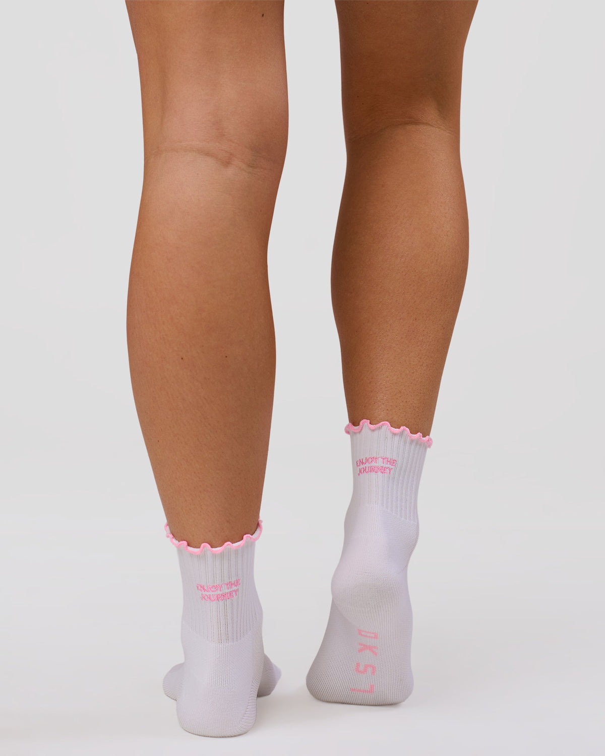 Studio image of Motion Performance Frill Socks - White-Pink Rose
