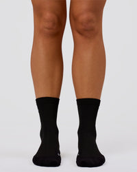 Studio image of Power Performance Quarter Socks - Black-White | Thumbnail Index: 2