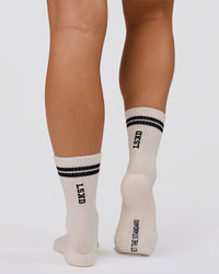 Studio image of The New Standard Crew Socks 3 Pack - Off White-White-Black | Thumbnail Index: 7