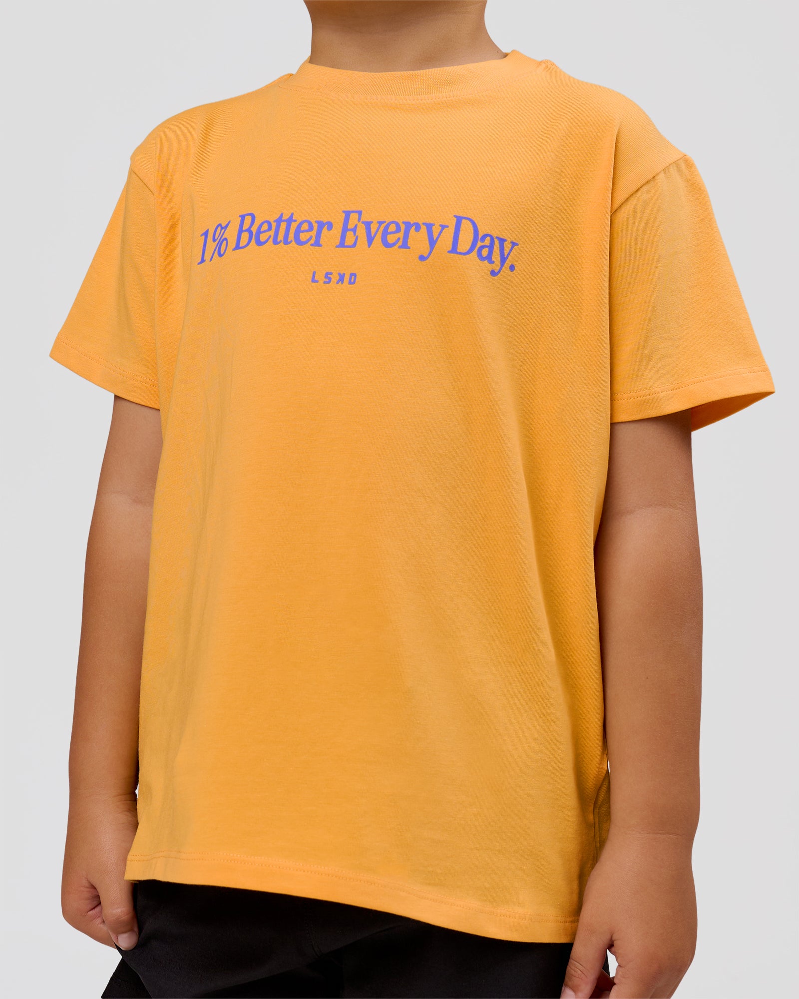 Studio image of VS6 1% Better Kids FLXCotton Tee - Warm Apricot