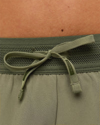 Woman wearing Accelerate 3" Mid-Rise Running Short - Pure Olive-Fog | Model:Xs | Size:ISSY | Thumbnail Index: 5
