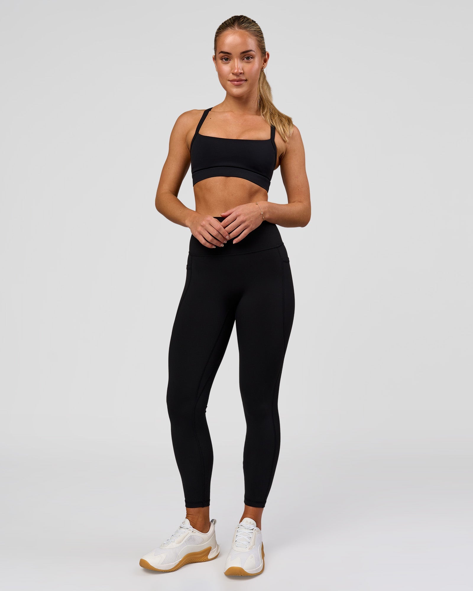 Woman wearing Fusion O.G Ultra High-Rise 7/8 Legging Pockets - Black | Model:Xs | Size:ISSY