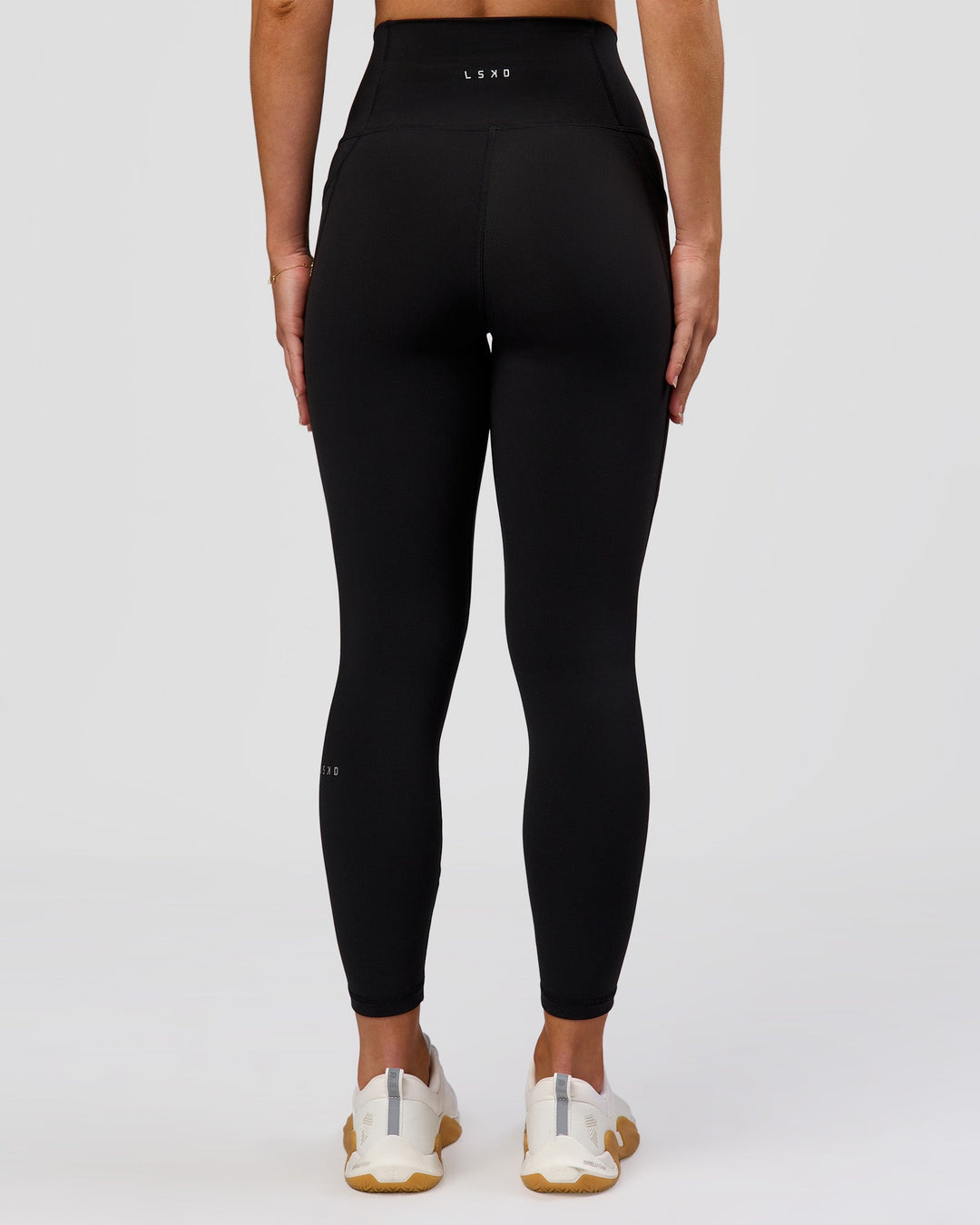 Woman wearing Fusion O.G Ultra High-Rise 7/8 Legging Pockets - Black | Model:Xs | Size:ISSY - view 6
