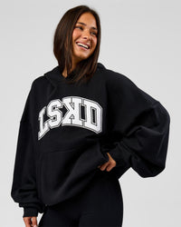 Woman wearing Varsity Boxy Hoodie - Caviar-White | Model:Bianca | Size:L