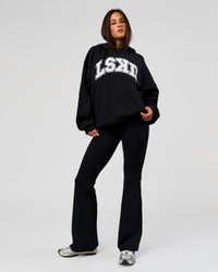 Woman wearing Varsity Boxy Hoodie - Caviar-White | Model:Bianca | Size:L