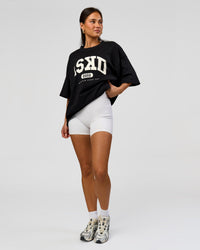 Woman wearing Varsity EST Heavyweight Oversized Tee  - Black-Off White | Model:Bianca | Size:L | Thumbnail Index: 4