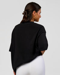 Woman wearing Varsity EST Heavyweight Oversized Tee  - Black-Off White | Model:Bianca | Size:L