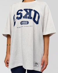 Woman wearing Varsity EST Heavyweight Oversized Tee  - Silver Marl-Future Navy | Model:Bianca | Size:L