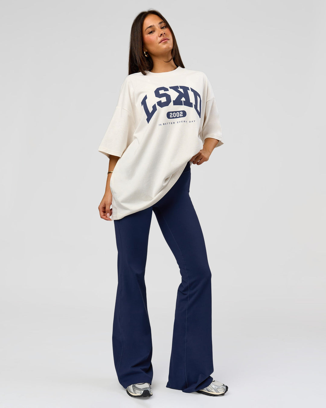 Woman wearing Varsity EST Heavyweight Oversized Tee  - Off White-Future Navy | Model:Bianca | Size:L