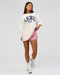 Woman wearing Varsity EST Heavyweight Oversized Tee  - Off White-Future Navy | Model:Bianca | Size:L