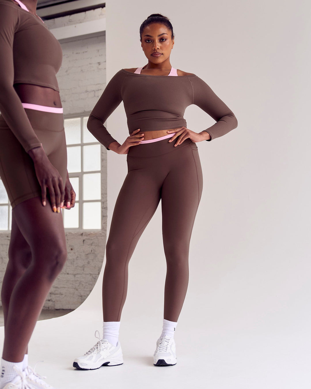 Woman wearing Bree Fusion High-Rise Full Length Legging Pockets - Cocoa Powder-Pink Rose | Model:Cass | Size:L - view 3