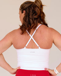 Woman wearing Podium Mesh Shelf Bra Tank - White | Model:Tia | Size:L | Thumbnail Index: 3