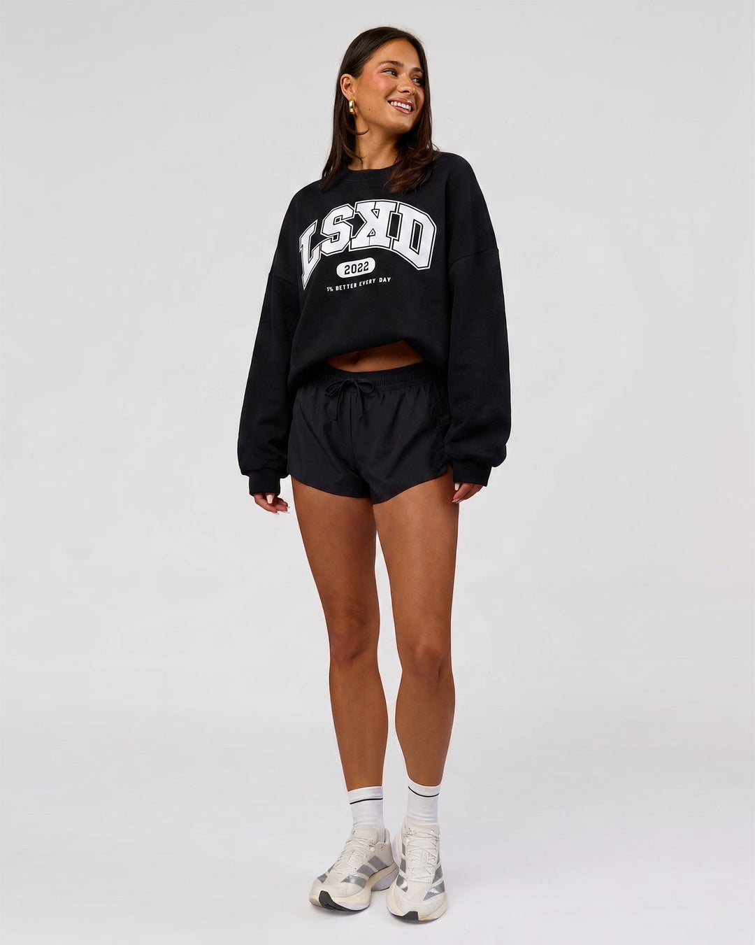 Woman wearing Varsity Boxy Crew in Caviar-Off White | Model:Varsity | Size:L