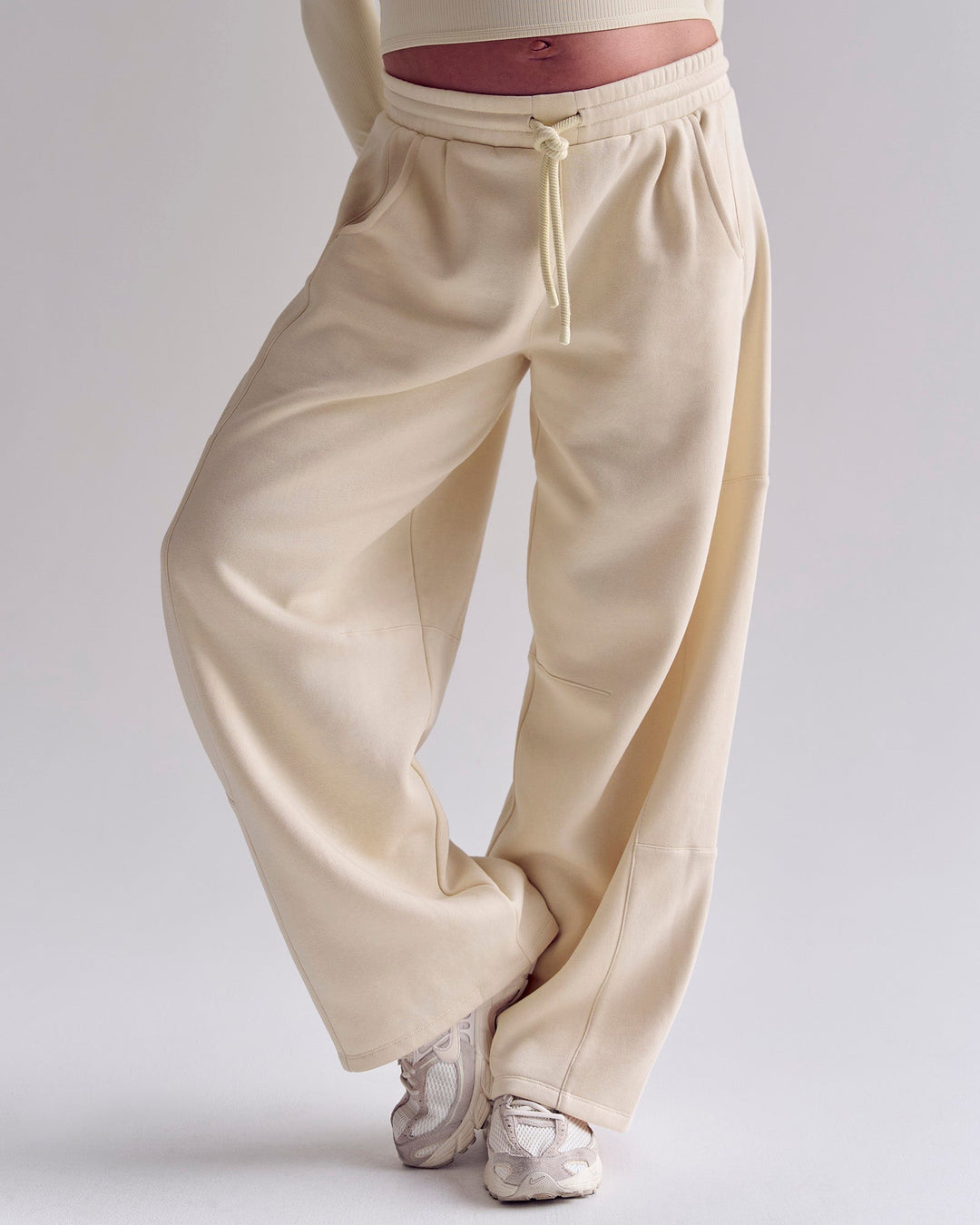 Woman wearing Bree Barrel Fleece Track Pant - Vanilla Bean | Model:Bree | Size:M - view 7
