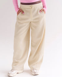 Woman wearing Bree Barrel Fleece Track Pant - Vanilla Bean | Model:Bree | Size:M | Thumbnail Index: 9