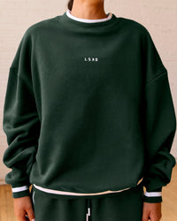 Woman wearing Go-To Dual Oversized Sweater - Midnight Green-White | Model:Meg | Size:M | Thumbnail Index: 1