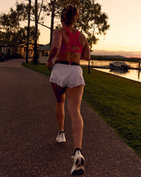 Woman wearing Accelerate 3" Mid-Rise Running Short - White-Future Navy | Model:Tia | Size:M | Thumbnail Index: 14
