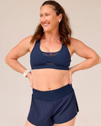 Woman wearing Tia-Clair Toomey-Orr Accelerate 3" Storage Running Short - Future Navy | Model:Tia | Size:M | Thumbnail Index: 3