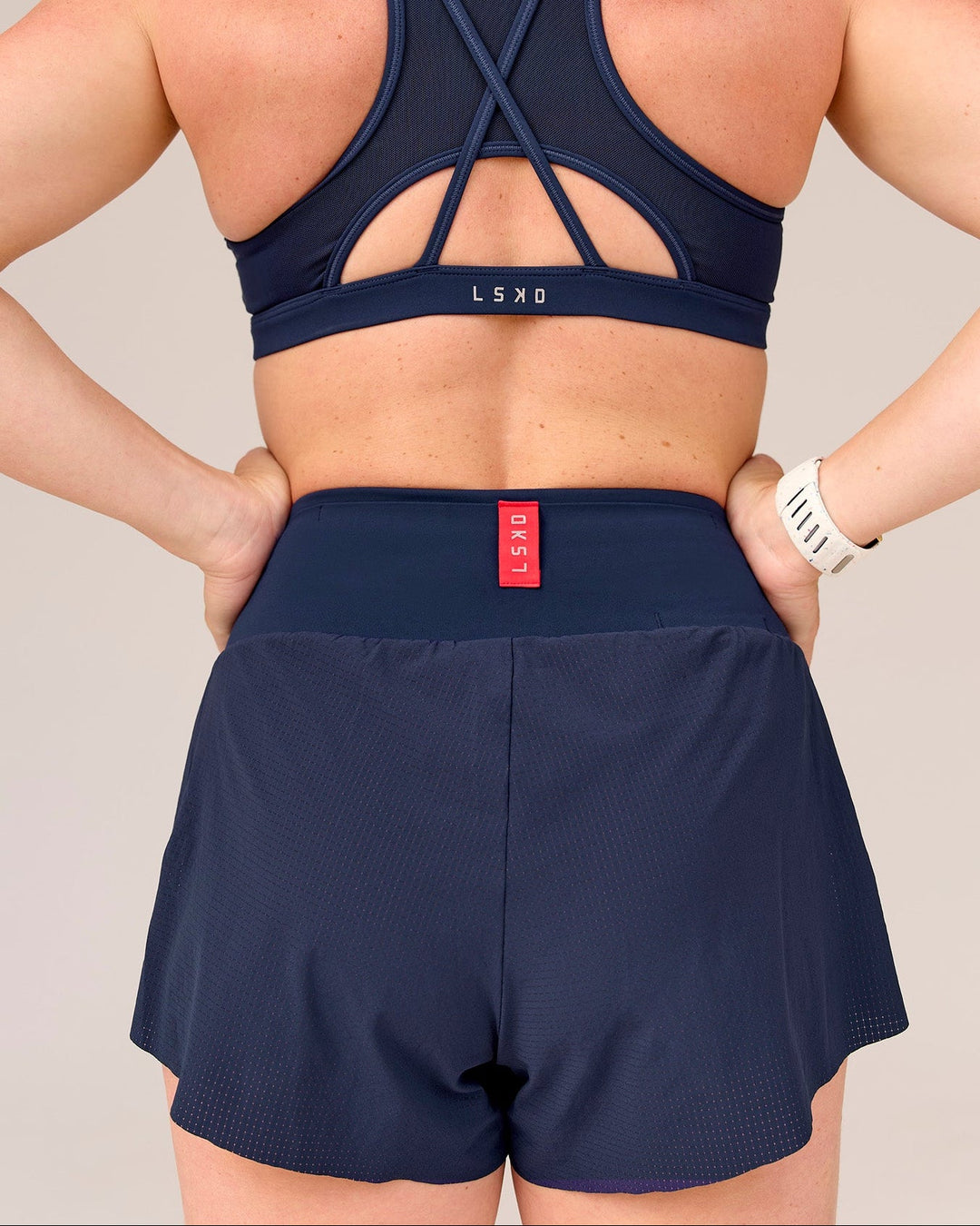 Woman wearing Tia-Clair Toomey-Orr Accelerate 3" Storage Running Short - Future Navy | Model:Tia | Size:M - view 14