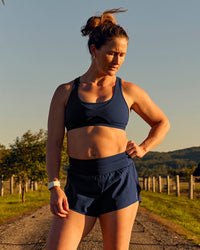 Woman wearing Tia-Clair Toomey-Orr Accelerate 3" Storage Running Short - Future Navy | Model:Tia | Size:M | Thumbnail Index: 0