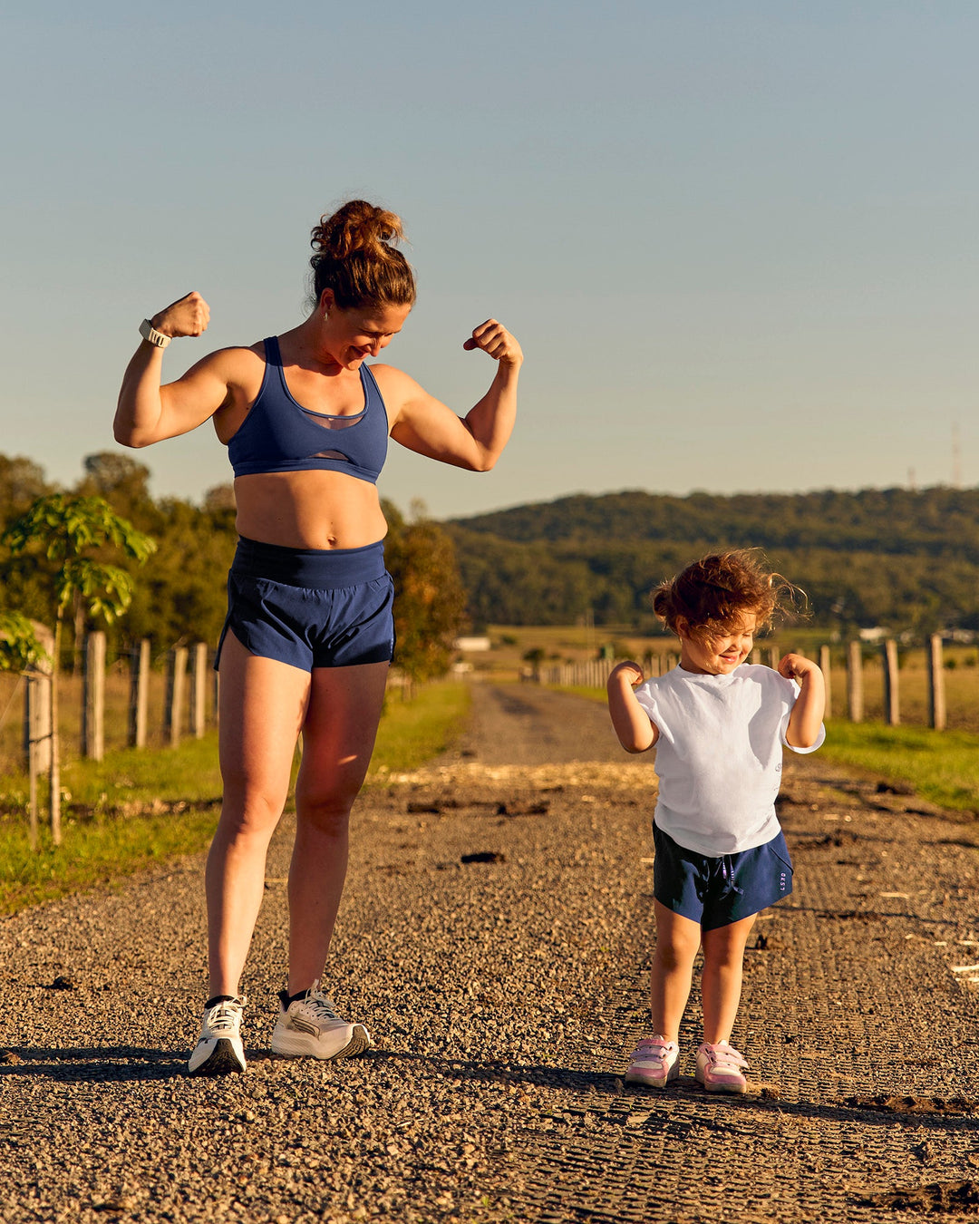 Woman wearing Unstoppable Racerback Sports Bra - Future Navy | Model:Tia | Size:M - view 14