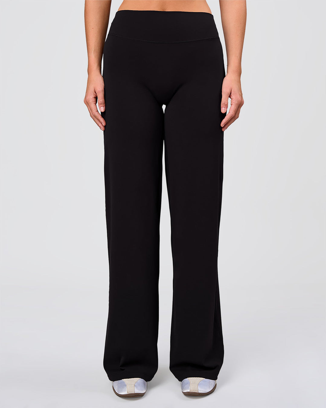 Woman wearing Elixir High-Rise Pant - Black | Model:Amity | Size:S - view 3