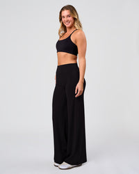 Woman wearing Elixir High-Rise Pant - Black | Model:Amity | Size:S | Thumbnail Index: 5