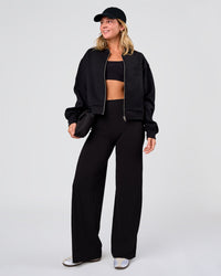 Woman wearing Elixir High-Rise Pant - Black | Model:Amity | Size:S | Thumbnail Index: 6