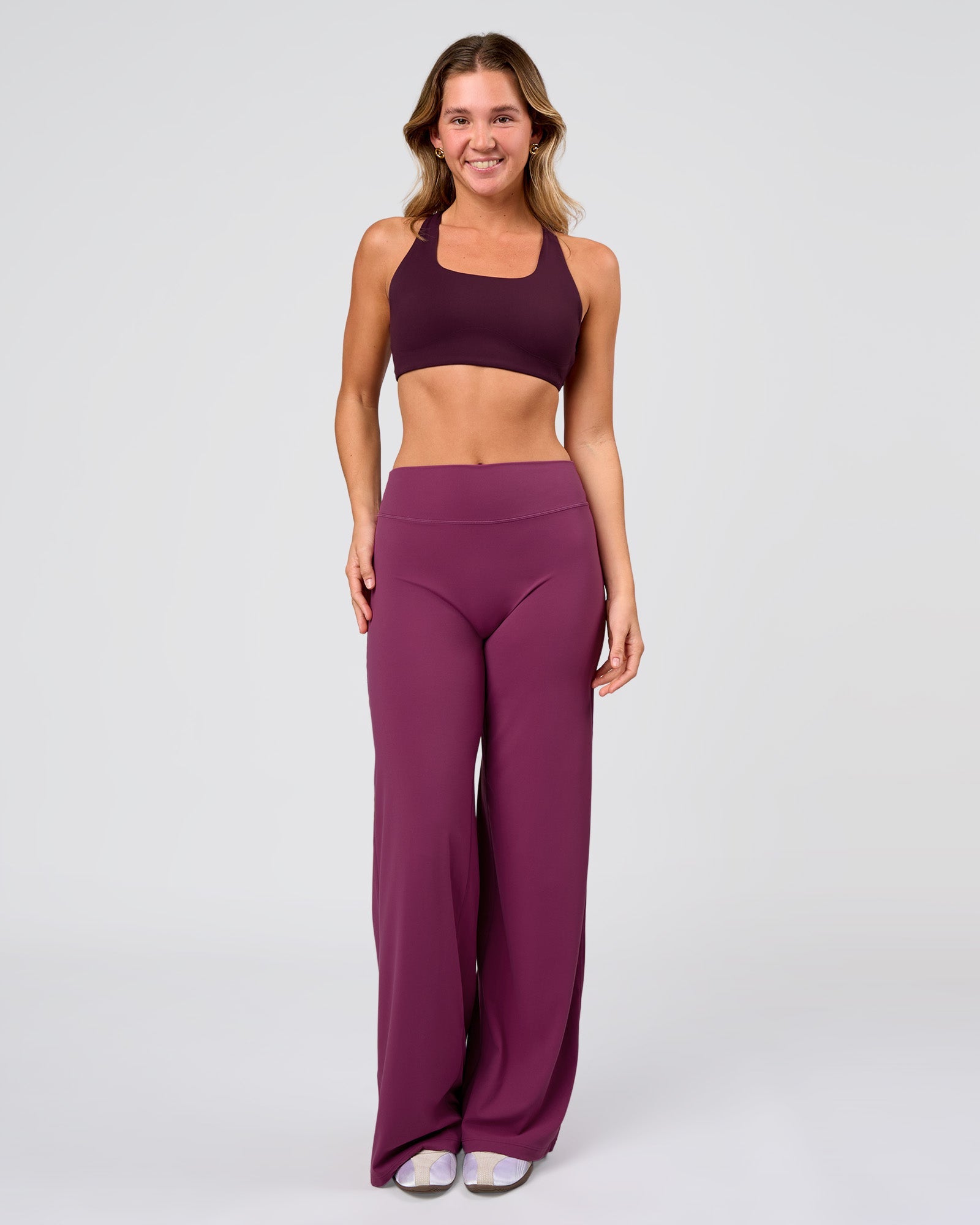 Woman wearing Elixir High-Rise Pant - Boysenberry | Model:Amity | Size:S