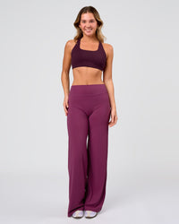 Woman wearing Elixir High-Rise Pant - Boysenberry | Model:Amity | Size:S | Thumbnail Index: 1