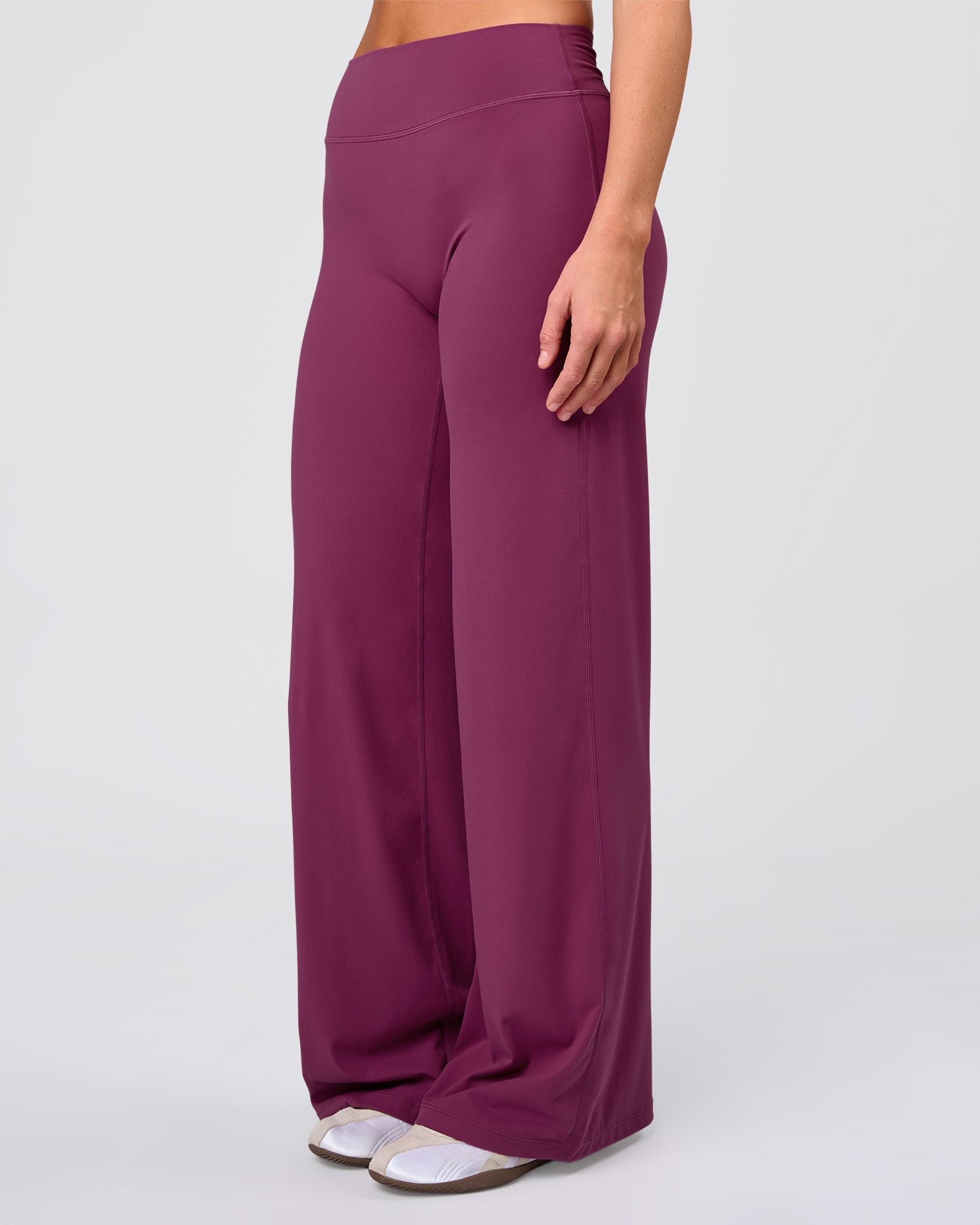 Woman wearing Elixir High-Rise Pant - Boysenberry | Model:Amity | Size:S