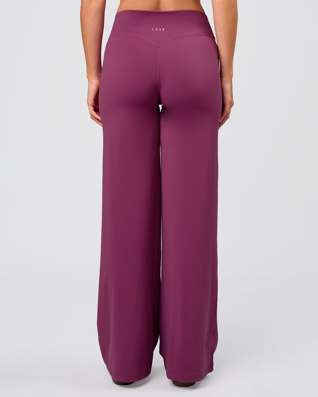 Woman wearing Elixir High-Rise Pant - Boysenberry | Model:Amity | Size:S - view 3