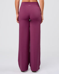 Woman wearing Elixir High-Rise Pant - Boysenberry | Model:Amity | Size:S | Thumbnail Index: 2