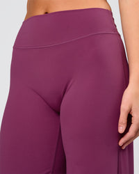 Woman wearing Elixir High-Rise Pant - Boysenberry | Model:Amity | Size:S | Thumbnail Index: 3