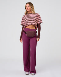 Woman wearing Elixir High-Rise Pant - Boysenberry | Model:Amity | Size:S | Thumbnail Index: 4