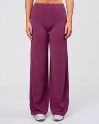Woman wearing Elixir High-Rise Pant - Boysenberry | Model:Amity | Size:S | Thumbnail Index: 5