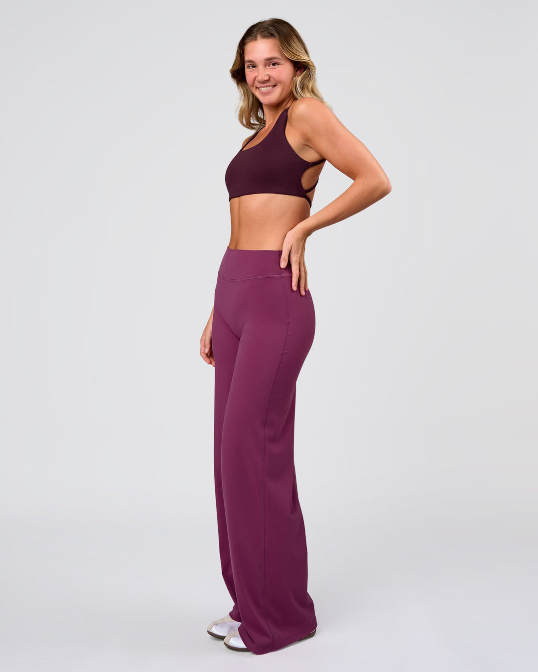 Woman wearing Elixir High-Rise Pant - Boysenberry | Model:Amity | Size:S - view 7