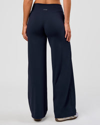 Woman wearing Elixir High-Rise Pant - Midnight Navy | Model:Amity | Size:S | Thumbnail Index: 3